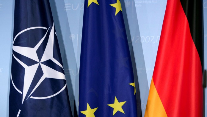 Flags of NATO, EU and Germany